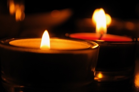 Candles lighting a room during a winter power outage