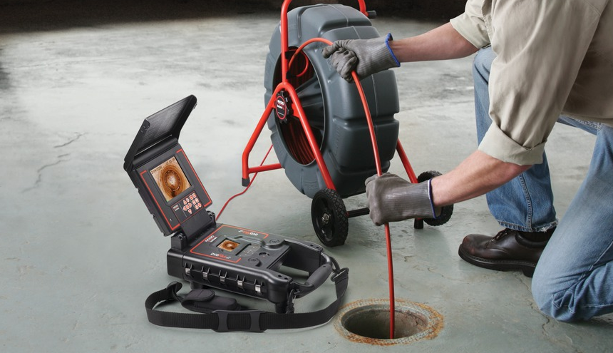 Machine detecting a clogged drain